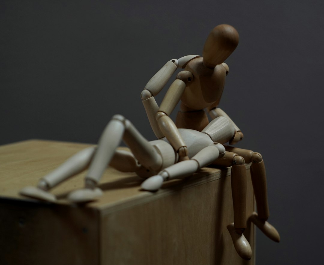 a-wooden-toy-on-a-table-p1xyudi6ku0